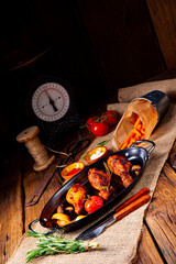grilled chicken legs in barbecue marinade with sweet potatoes
