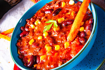 chili con carne with sweet potato and spicy nachos