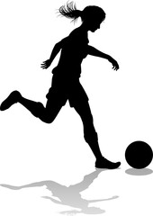 Fototapeta na wymiar A female soccer football player woman in silhouettes