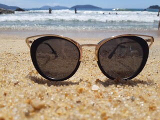 glasses on the beach