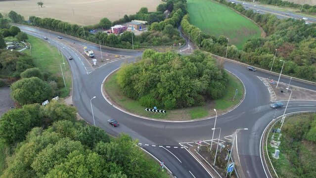 Aerial View of British Motorways With Fast Moving Traffic at Peak Time. M1 J11 and  J7 Motorways Junction Interchange. Time Lapse Shot captured on 7th Sep 2022