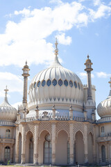 Fototapeta na wymiar Brighton pavilion gardens blue sky clouds 