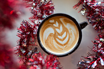 Peppermint mocha latte with latte art in foam
