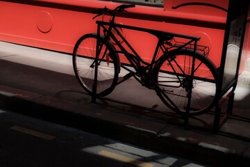 Bicycle on street in front of store in France