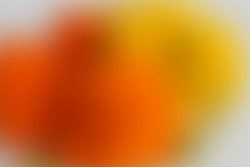 Abstract yellow-orange defocused background. Blurred lines and spots. Background for the cover of a laptop, notebook.