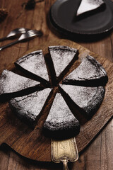 Kladdkaka. Traditional Swedish moist chocolate cake on wooden table. Fika. Hygge. Winter treat - 529249067