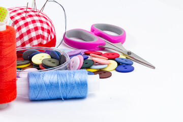 Sewing supplies, needles and thread, concept of a banner with goods for needlework and creativity, copy space, copy space.