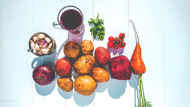 Products for autumn borscht lie on a white background. Preparation of borscht