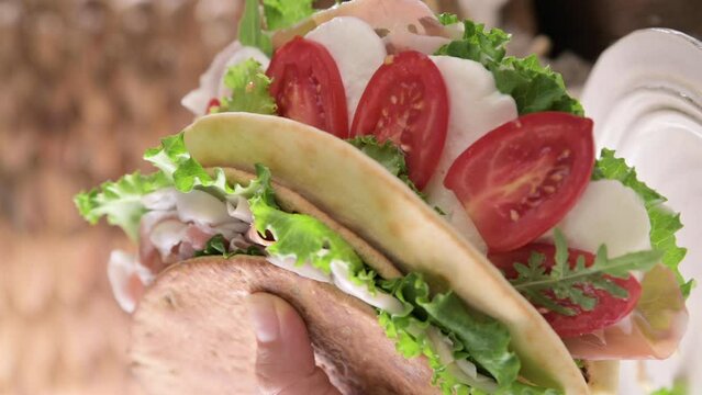 Spianata Sarda. Typical tortilla bread in italy Sardinia region. Baking bread Thin round with different flour. High quality footage. Vertical video