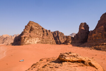 Wadi Rum Desert landscape in Jordan. Dunes and mountains. Travel and tourism concept.