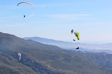 	
Paragliders in the Mountains of Andalucia in Spain
