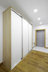 Sliding wardrobe in the hallway near the front door