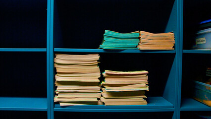 Blank School Workbooks stored in a Cubby