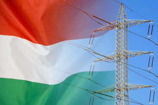 Hungary flag on electric pole background. Power shortage and increased energy consumption in Hungary. Energy crisis in Hungary - Powered by Adobe