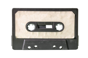 An old vintage cassette tape from the 1980s (obsolete music technology). Black plastic body, old worn textured paper label. Isolated.
