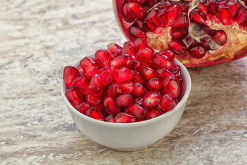 Ripe red Pomegranate seeds in the bowl