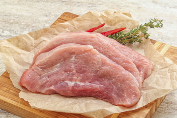 Raw pork schnitzel for roast
