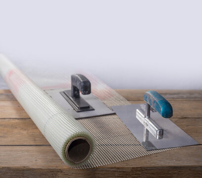 Fiberglass Reinforcing Plastering Mesh used for plaster work with rectangular trowel