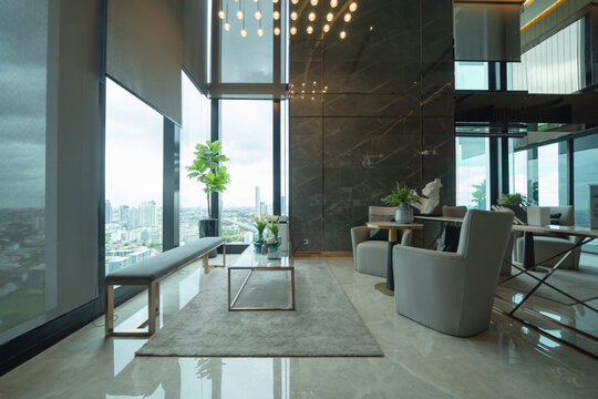 Inside Of Modern Hotel Lobby, Entrance And Reception, Waiting Area With Urban City View Of Outdoor, Indoor.