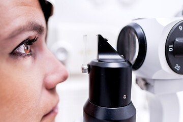 Woman during ocular tonometry procedure