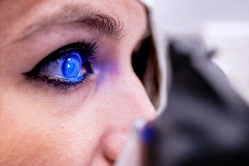 Woman during ocular tonometry procedure