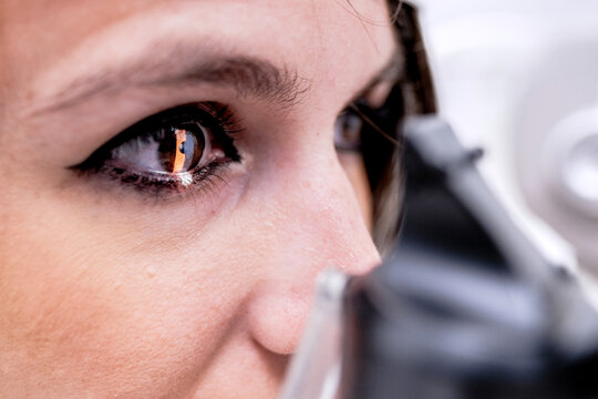Woman during ocular tonometry procedure