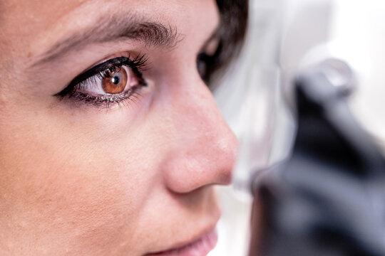 Woman during ocular tonometry procedure