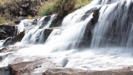 Fototapeta premium waterfall in kodanadu tamilnadu. Water falls in the hidden waterfall in kodanadu