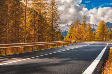 Beautiful landscape with roadway. Highway in mountains in autumn day in Italy, empty asphalt road....