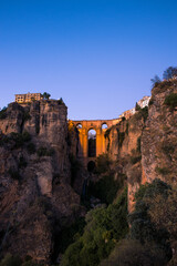 Fototapeta na wymiar Vertical photography of the bridge of Ronda at sunset (Ronda, Andalusia, Spain)