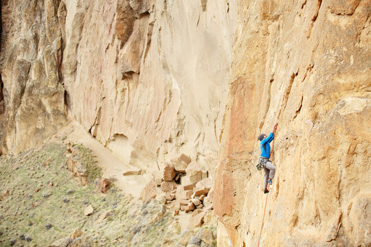 High angle view of male climber climbing mountain