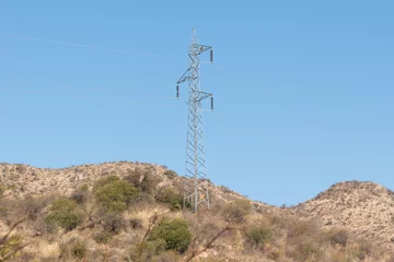 Tableaux ronds sur aluminium Cerro Torre torre de distribucion de alta tension ubicada en la cima de un cerro