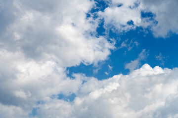 Naklejka na ściany i meble Blue cloudy sky on a clear day