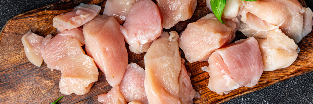 raw chicken pieces slice of poultry meat healthy meal food snack diet on the table copy space food background rustic top view keto or paleo diet