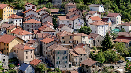 Fototapeta na wymiar Group of rural and residential houses in a village in the Ligurian hinterland, in Italy.