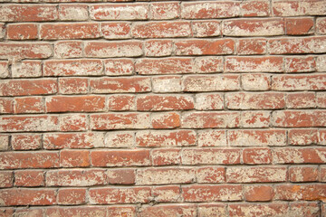 Abstract background red brickwork aged by time.