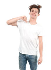 Positive young guy doing a gesture of pride