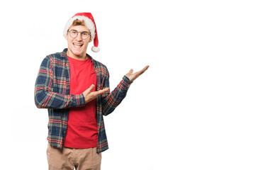 Young man at Christmas doing gestures