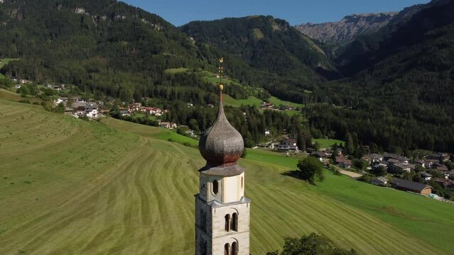 St Valentin Chapel, San Valentino in Kastelruth, Castelrotto, South Tyrol Italy. Italian Dolomites aerial view. Trentino Alto Adige.