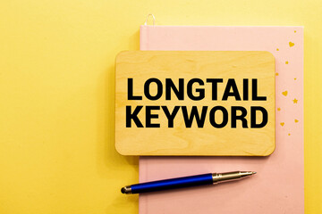 black pancel write a text Longtail Keyword on the yellow
