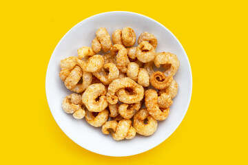 Crispy pork rinds or pork snack.