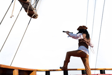 funny the pirate captain traveler  discoverer and explorer on the vintage pirate ship  on white...
