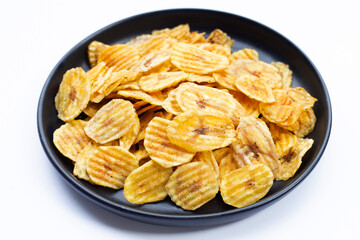 Banana slice chips on white background.