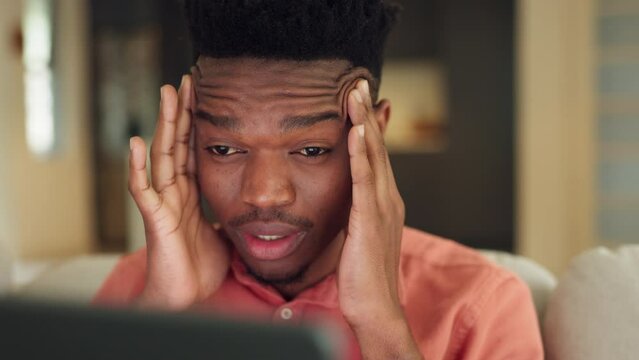 Tired, headache and burnout student studying on laptop for elearning, education or university exam in living room home. Mental health, migraine or stress black man reading digital work or online test
