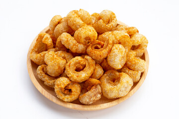 Crispy pork rinds or pork snack.