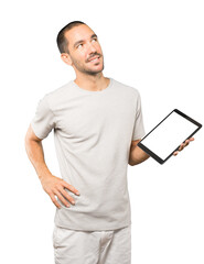 Young man doing gestures using a tablet