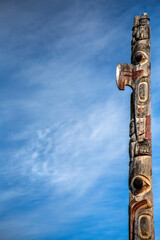 Low angle view of totem pole against sky