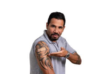 man points to bandage on arm, vaccine on arm, adult vaccination