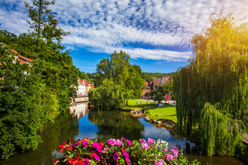 Beautiful floral colorful town Tubingen in Germany (Baden-Wurttemberg). Houses at river Neckar and Hoelderlin tower, Tuebingen, Baden-Wuerttemberg, Germany. Tubingen, Germany. - obrazy, fototapety, plakaty