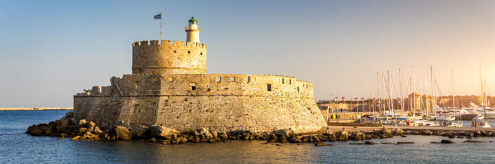 Panoramic view of Rhodes old town on Rhodes island, Greece. Saint Nicholas Fortress cityscape with...